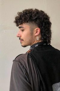 Timeless appeal of mullet hairstyles for men with curly hair 16 ideas