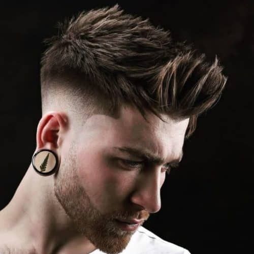 Mastering the trend: Men's skin fade haircut extended at the top of the ...