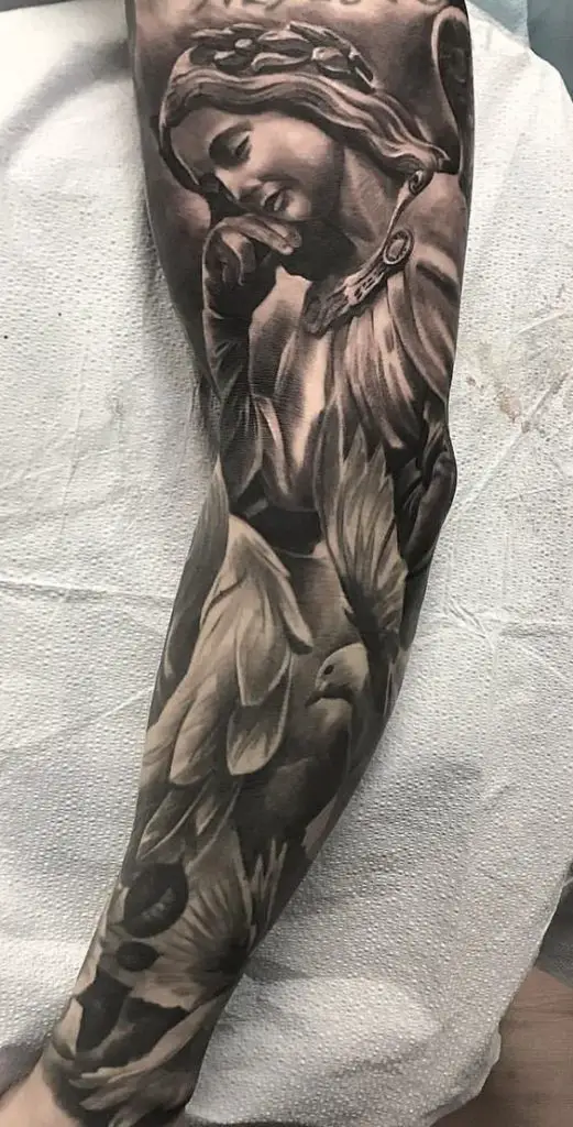 Explore 2024 S Angel Man Tattoo Trends For Fashion Forward Men   3 44 521x1024 